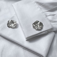 Decorative Concepts cufflinks fastened on a shirt cuff, drawn from an artist's sketchbook — Botymau Coesau Arian