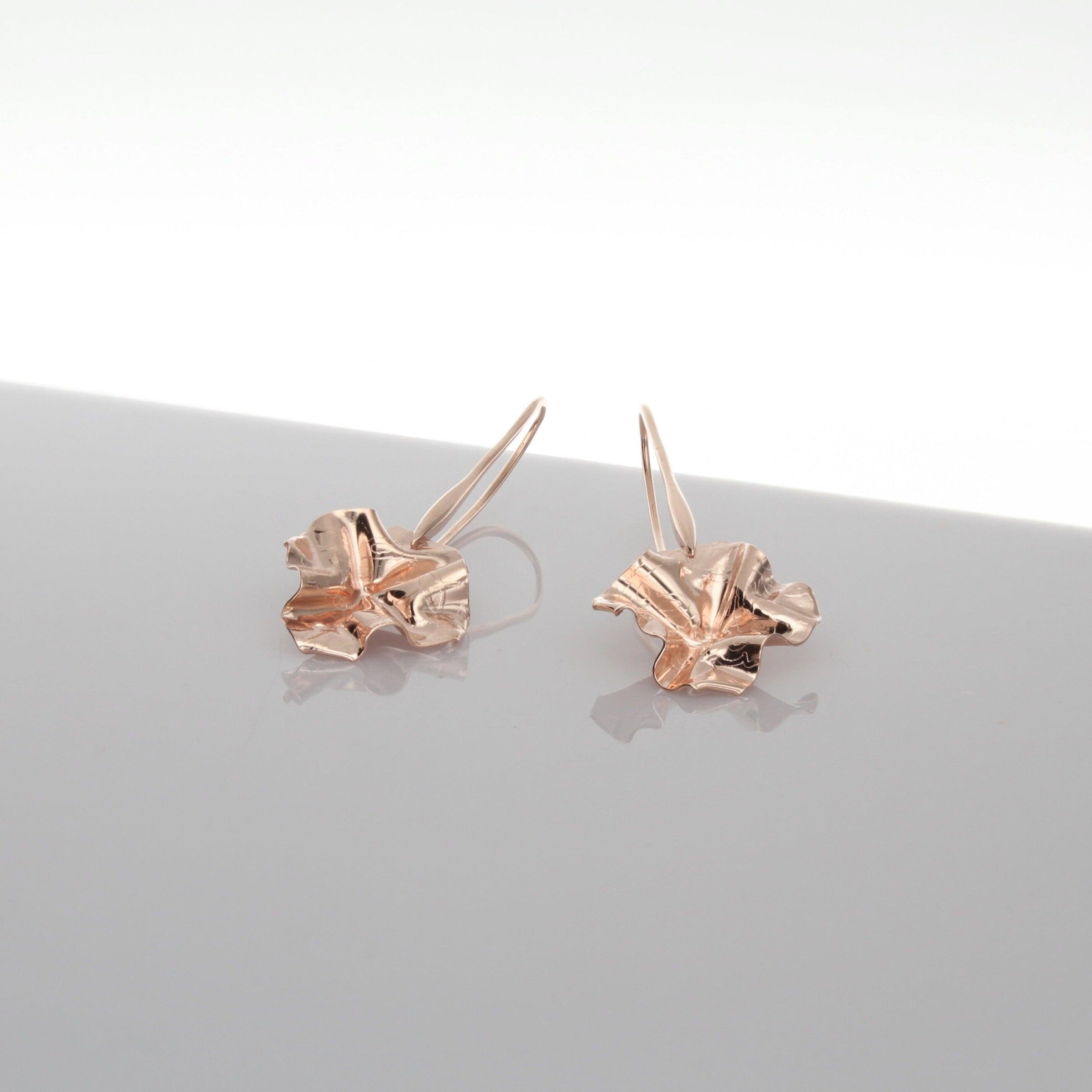 Decorative Concepts drop earrings in 18ct rose gold plated silver, front view