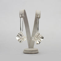 Decorative Concepts drop earrings, tracing the shape of a sketched line on paper — Clustdlysau Arian