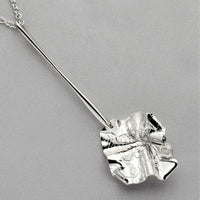 Close-up on the pen-drawn line of a Decorative Concepts pendant — Mwclis Arian
