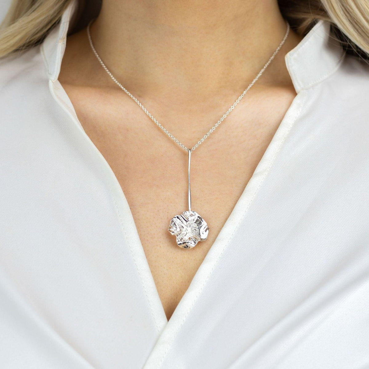 Decorative Concepts sterling silver drop pendant, side view