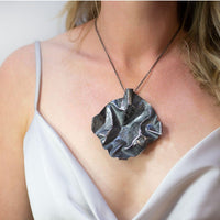 Side view of the Decorative Concepts large black pendant, an artist's sketchbook page — Mwclis Arian