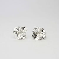 Decorative Concepts large sterling silver stud earrings, front view