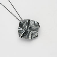 Decorative Concepts medium pendant in black oxidised silver, front view