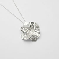 Decorative Concepts medium sterling silver pendant, front view