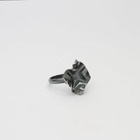 Decorative Concepts ring top, black oxidised silver — a bold pencil mark cast in metal — Modrwy Arian