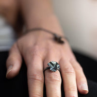 Side view of the Decorative Concepts black ring, drawn from a sketchbook page — Modrwy Arian