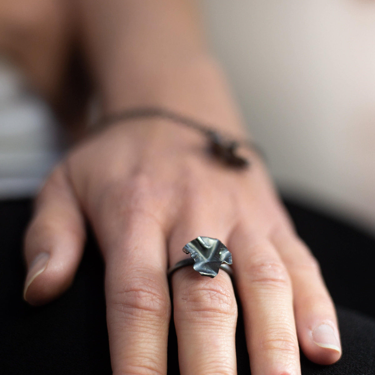 Decorative Concepts medium top ring in black oxidised silver, side view