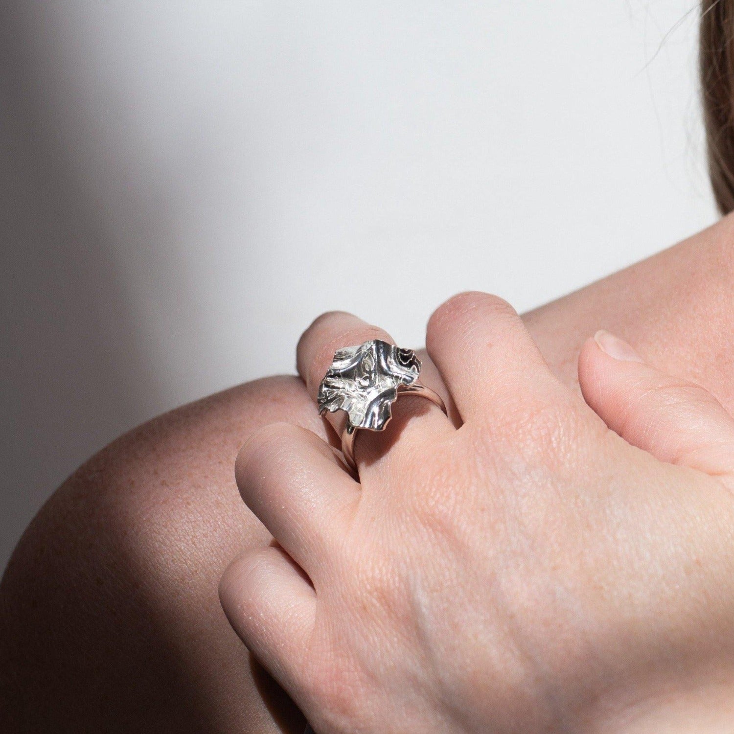 Side view of the Decorative Concepts ring, drawn from a sketchbook page — Modrwy Arian