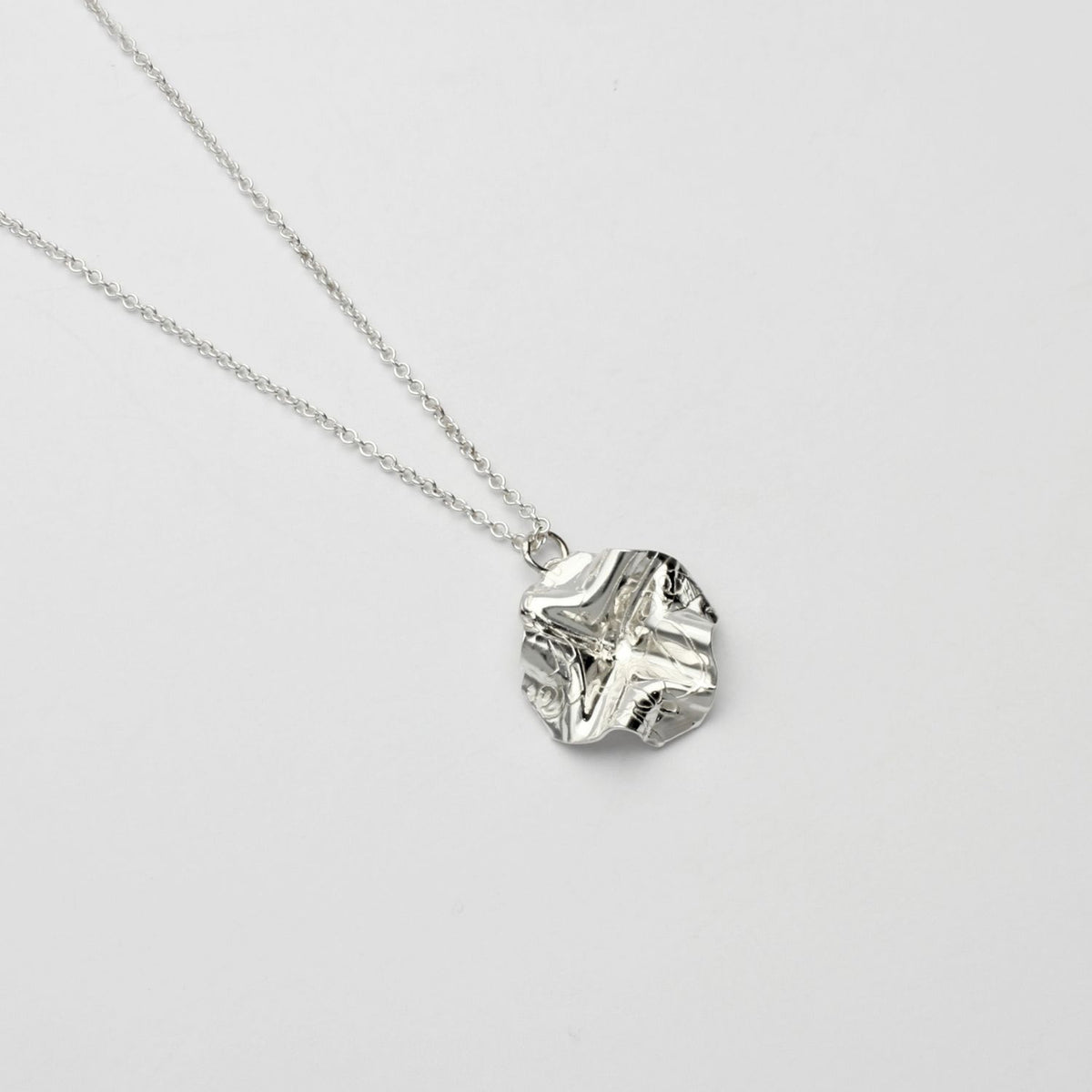 Decorative Concepts pendant, sterling silver — a mark drawn from Mari's own sketchbook — Mwclis Arian