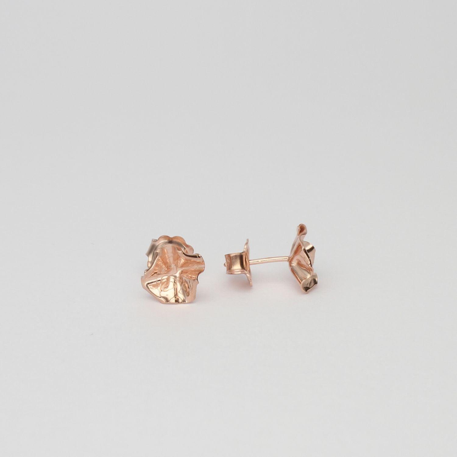 Decorative Concepts small stud earrings in 18ct rose gold plated silver, side view