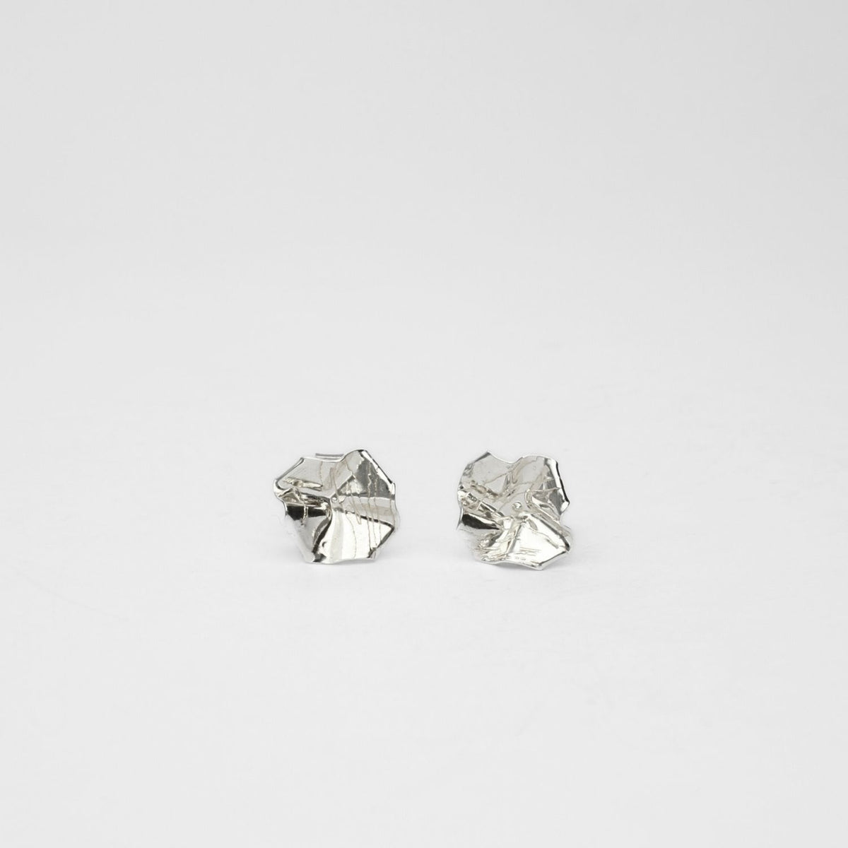 Decorative Concepts studs, sterling silver — covered in Mari's own handwriting — Clustdlysau Arian