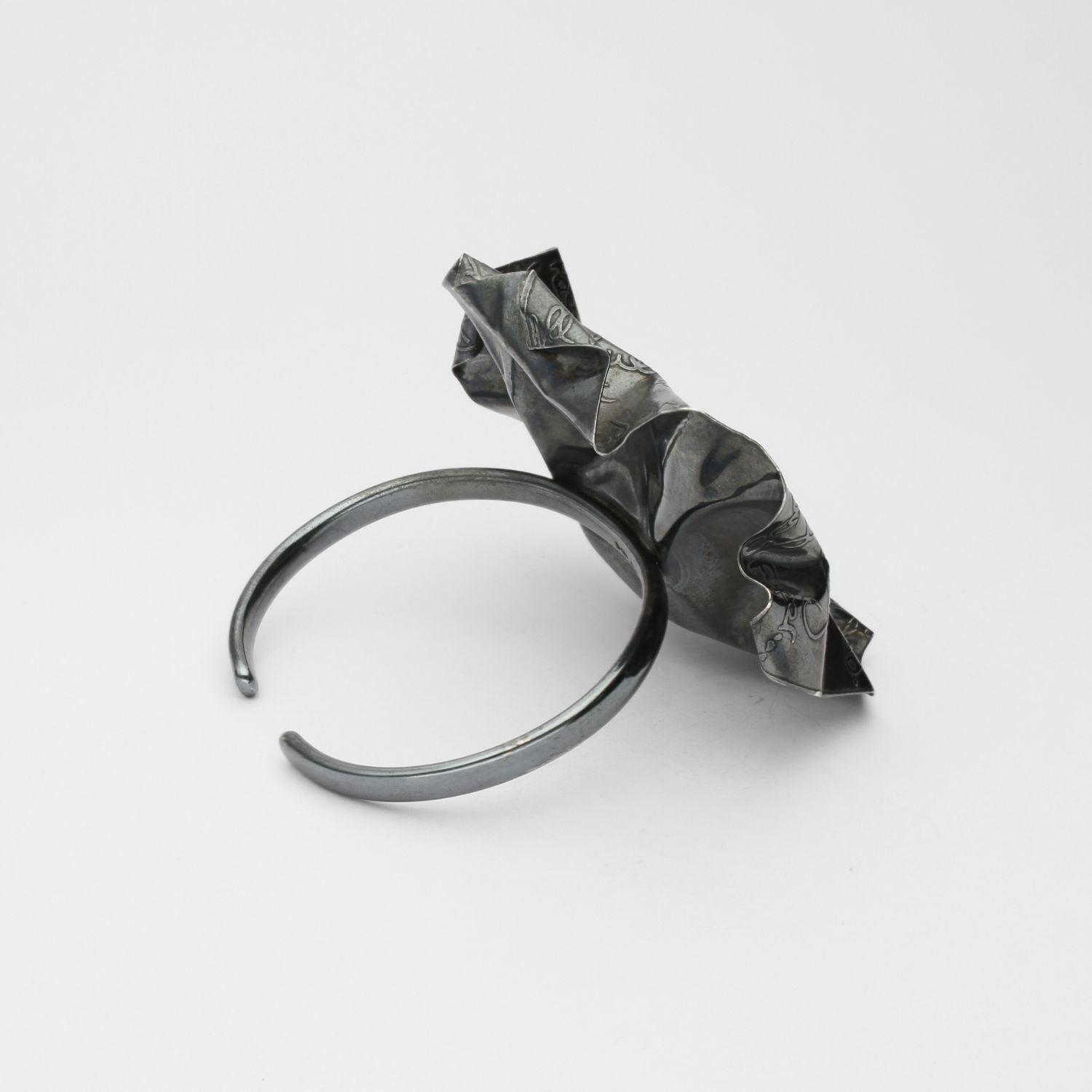 Decorative Concepts torque bangle in black oxidised silver, side view