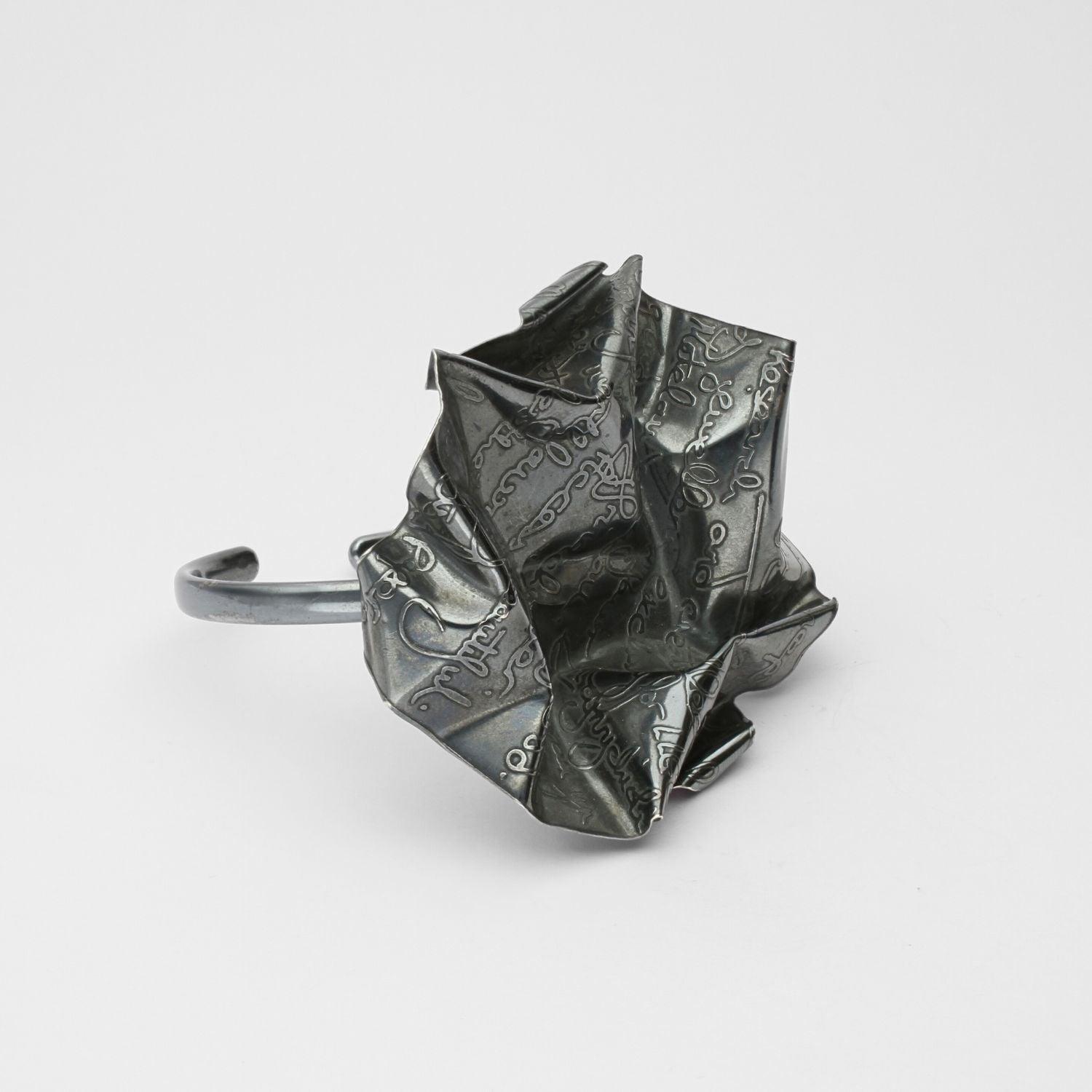 Decorative Concepts torque bangle in black oxidised silver, front view