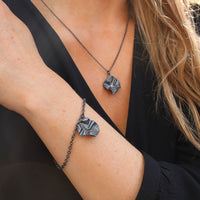 Decorative Concepts: Black Silver Charm Bracelet