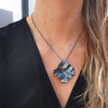 Decorative Concepts: Medium Black Silver Pendant