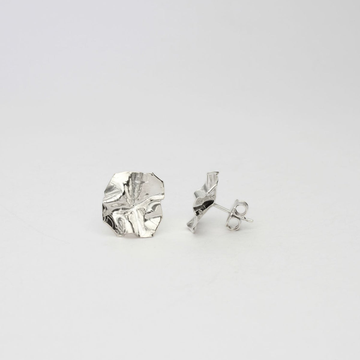 Decorative Concepts: Medium Silver Earrings