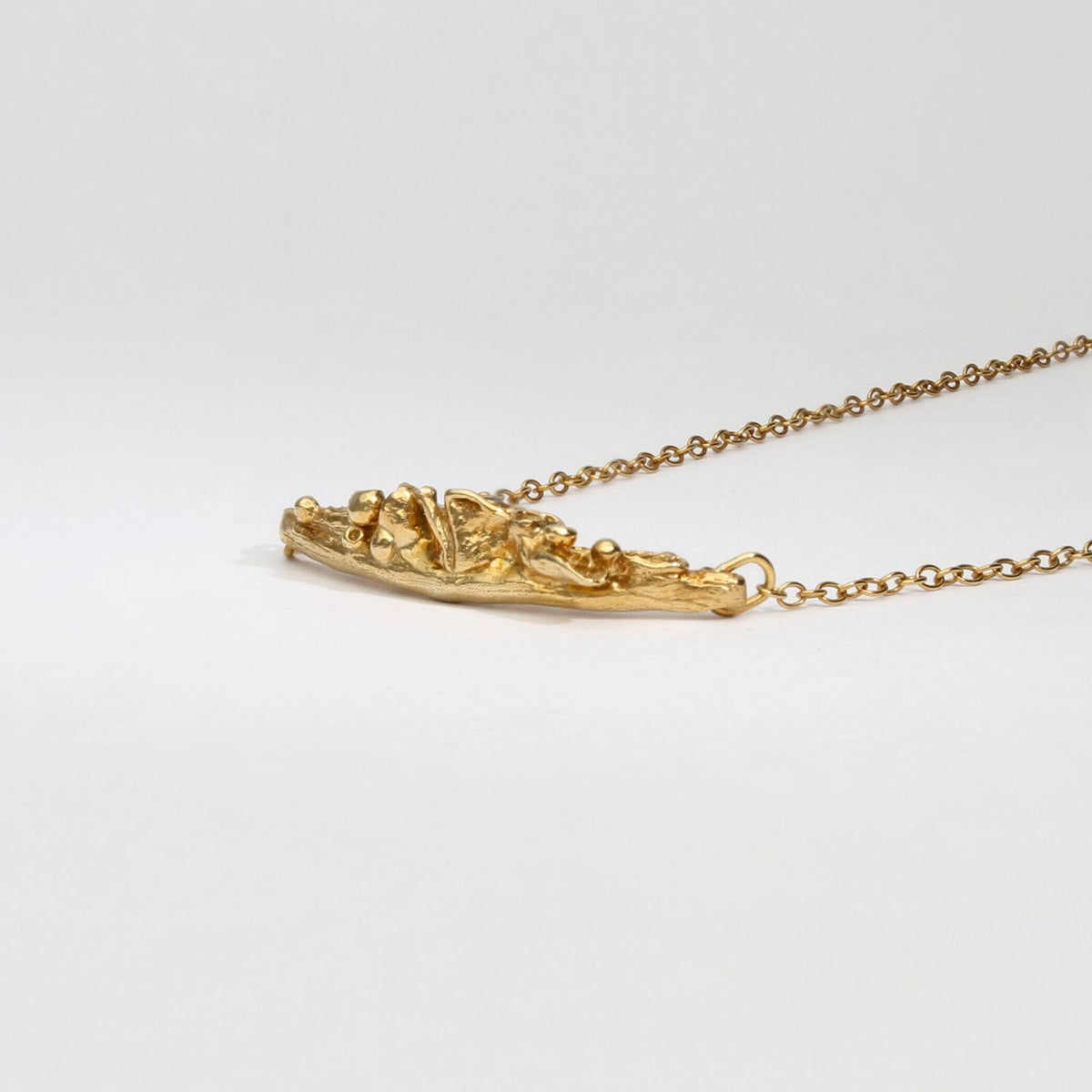 Sea thrift 9ct yellow gold pendant with diamonds by Charlotte Rowenna