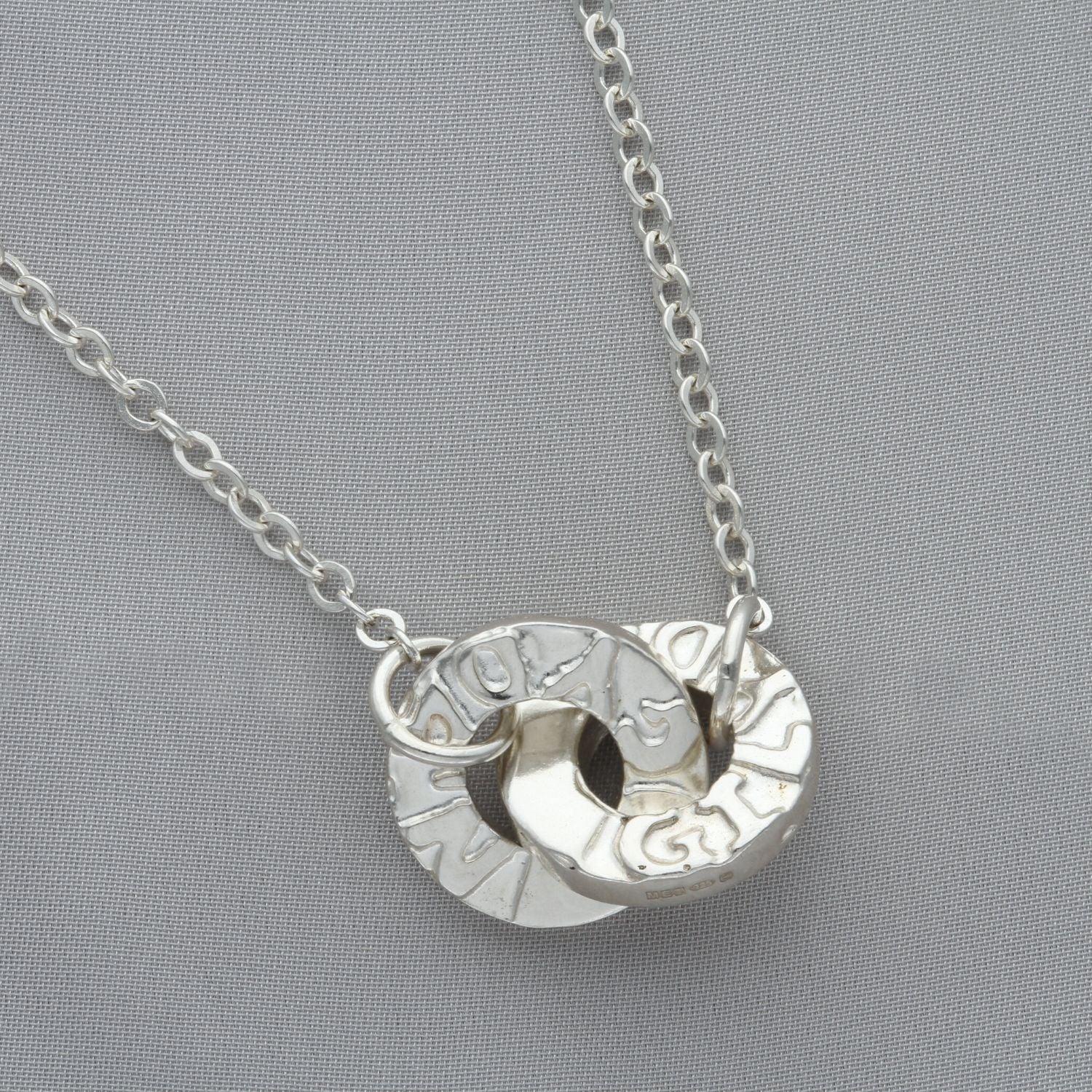 Gyda'n Gilydd sterling silver linked pendant, close-up detail