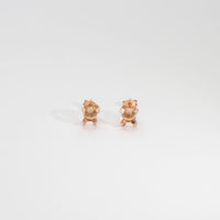 Earrings: 9ct rose gold and quartz stud earrings by Hanna Tommola