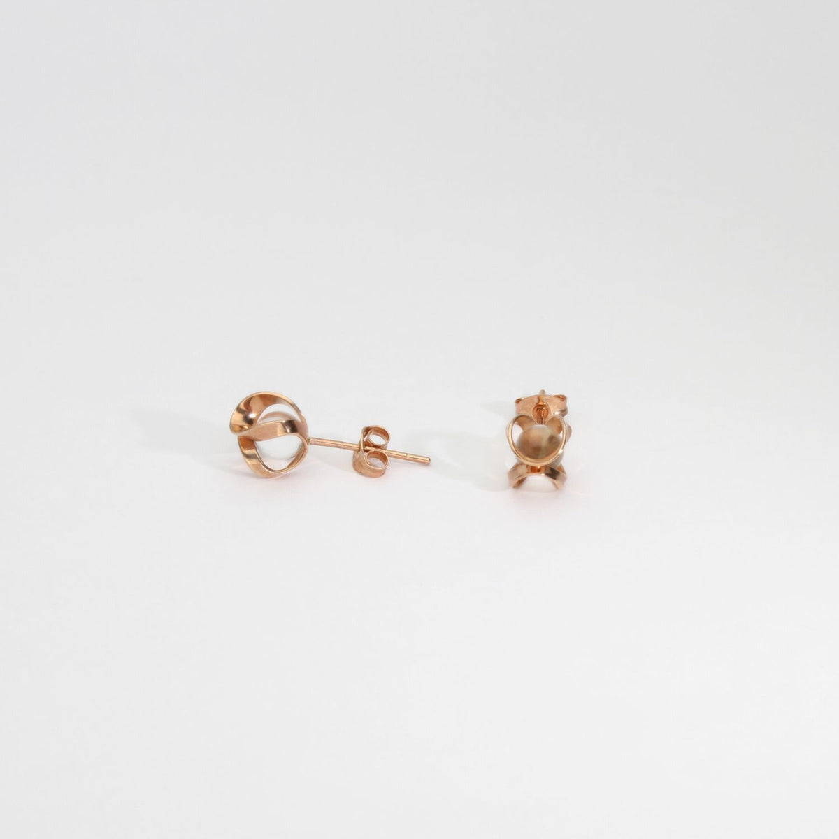 Earrings: 9ct rose gold and quartz stud earrings by Hanna Tommola