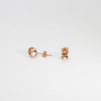 Earrings: 9ct rose gold and quartz stud earrings by Hanna Tommola