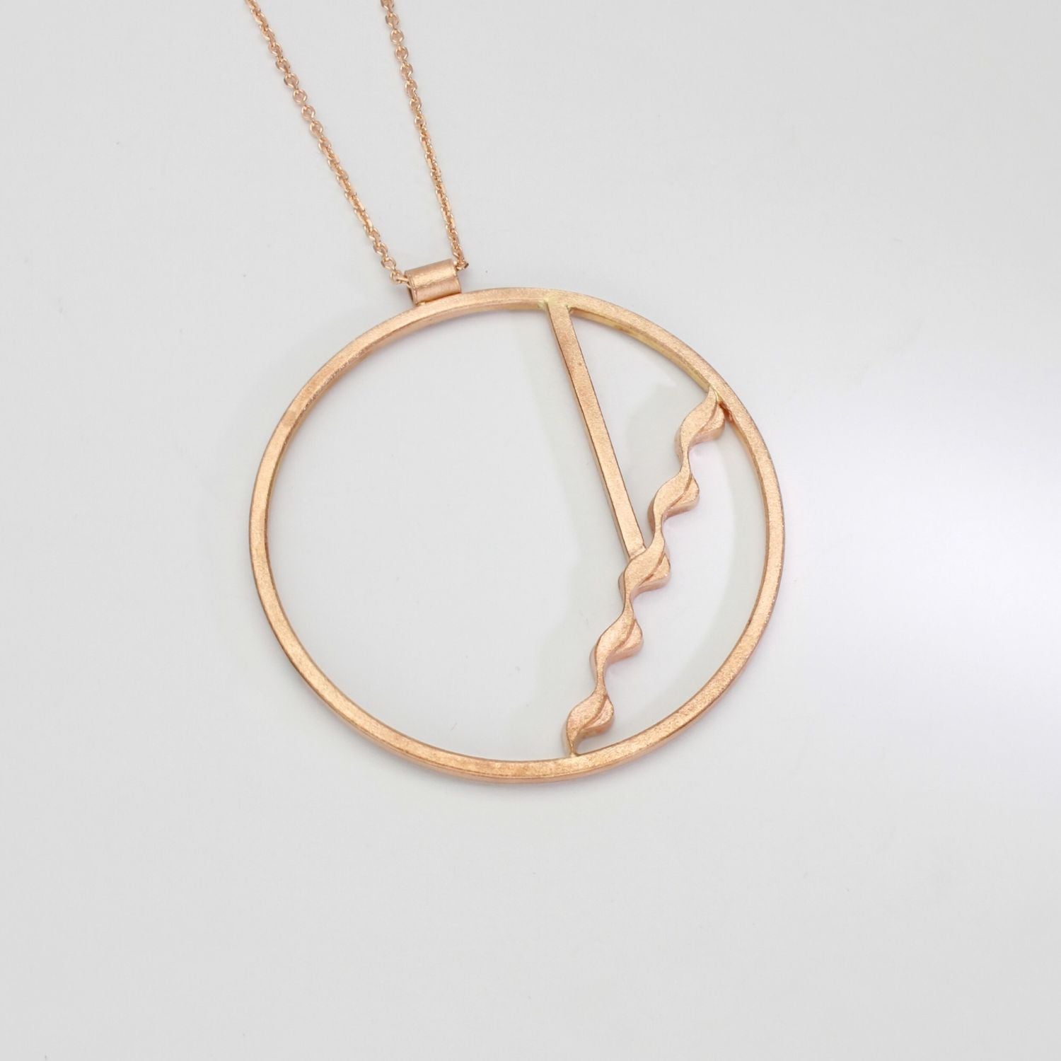 Glissando nell' oro: 9ct Rose Gold Circular Pendant