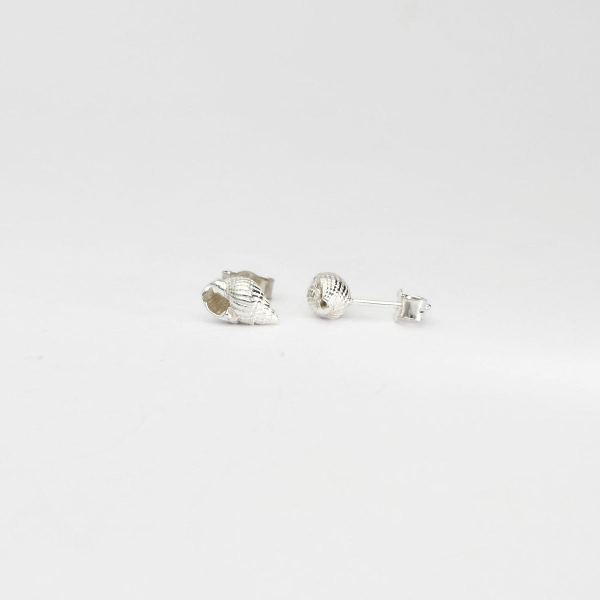 Large whelk silver studs by Kate Wimbush