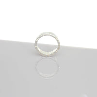 Linear sterling silver ring, close-up detail