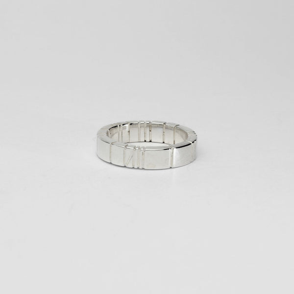 Linear ring, sterling silver — clean lines drawn from Welsh slate — Modrwy Arian