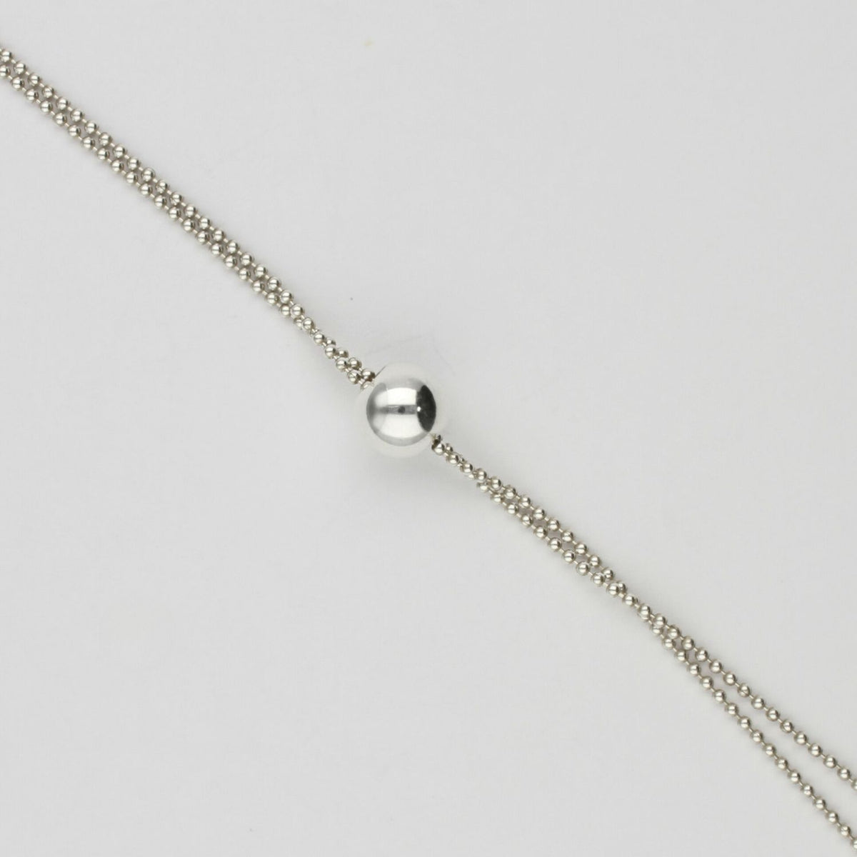 Pebble stack silver necklace by Polished Grey
