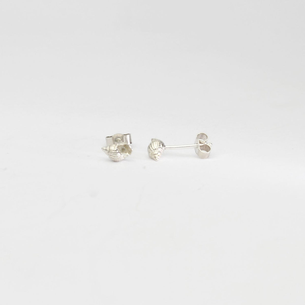 Small whelk silver studs by Kate Wimbush