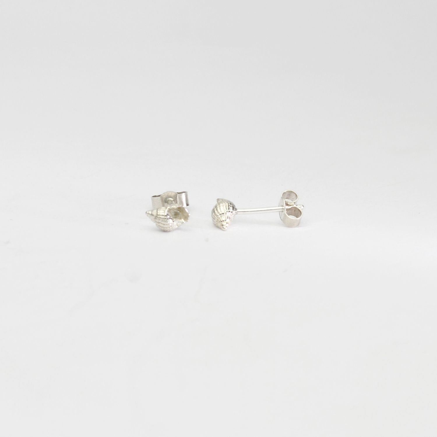 Small whelk silver studs by Kate Wimbush